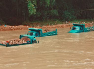 trucks in flood